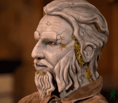 Statue of Man With Beard and Cracked Face