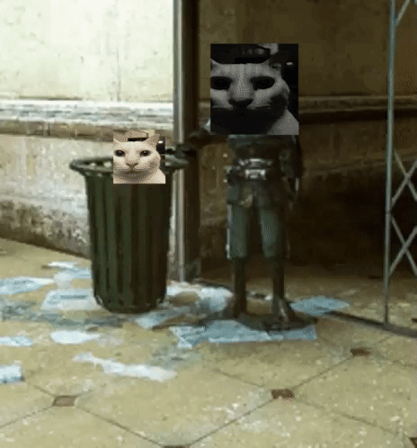 Statue Of Man With Cat On Head Next To Trash Can GIF
