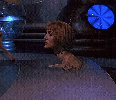 Statue Of Woman With Head On Dog's Back GIF