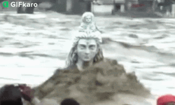 Statue Soaked In The Flooding GIF
