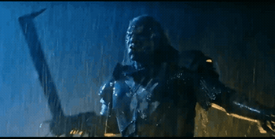 Statue Standing In Rain With Arm Outstretched GIF