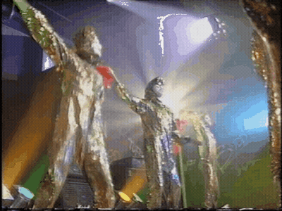 Statue With Red Heart On Chest On Stage GIF