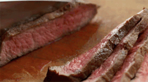 Steak Being Sliced On Cutting Board GIF