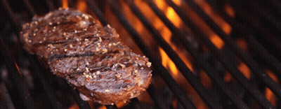 Steak Cooking On Grill With Flames GIF