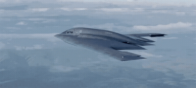 Stealth Bomber Flying Through Sky GIF