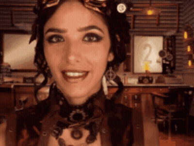 Steampunk Woman Smiling With Goggles GIF