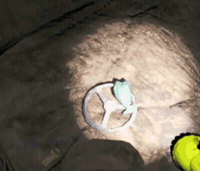 Steering Wheel On Ground In Dark Room GIF