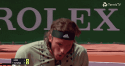 Stefanos Tsitsipas Tennis Court Rolex Logo GIF