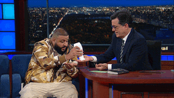 Stephen Colbert And DJ Khaled Rubbing Lotion GIF
