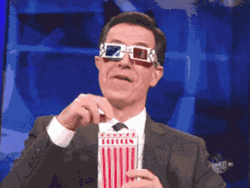 Stephen Colbert Watching Eating Popcorn GIF