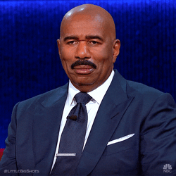 Steve Harvey Snickering GIF