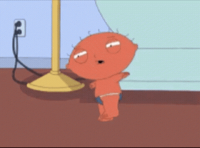 Stewie Family Guy Standing In Front Of Lamp GIF