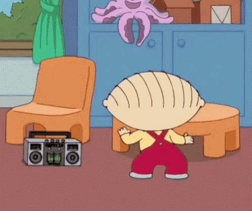 Stewie From Family Guy Is Dancing In Front Of A Boombox In A Living Room . GIF