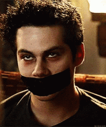 Stiles Stilinski With Covered Mouth GIF