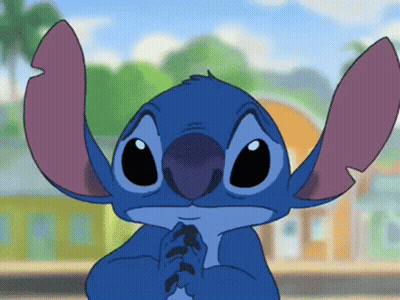 Stitch From Disney 'S Lilo And Stitch Is Praying With His Hands Folded GIF