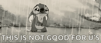 Stitch From Disney 'S Lilo And Stitch Is Standing In The Rain . GIF