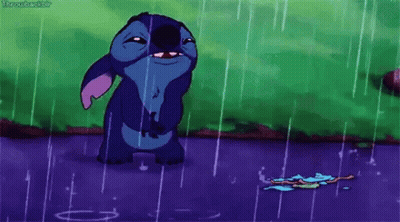 Stitch From Lilo And Stitch Standing In Rain GIF