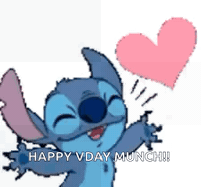 Stitch Holding Pink Heart Saying Happy Vday Munch GIF