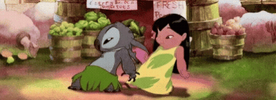 Stitch Is Standing Next To A Girl In A Yellow Dress In Front Of A Fruit Stand . GIF