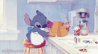 Stitch Sitting On Stool Preparing Food GIF