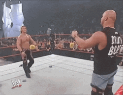 Stone Cold Beer Steve Austin Facing Undertaker GIF