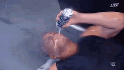 Stone Cold Drinking Beer While Lying Down GIF