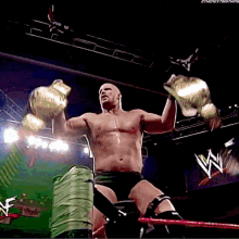 Stone Cold Lifting Two Belts GIF