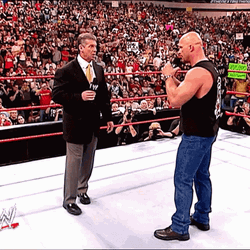 Stone Cold Stunner Face Off Vince McMahon GIF