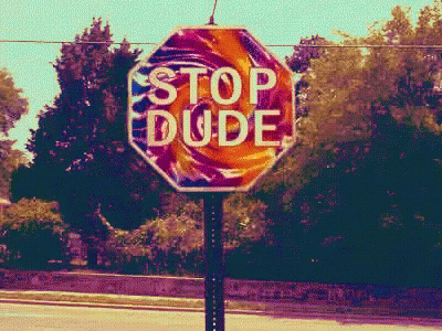 Stop Dude Sign With Lollipop GIF
