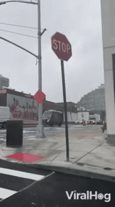 Stop Sign On Street With Viralhog Logo GIF