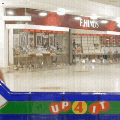 Store With Red Sign Saying F.Hinds GIF