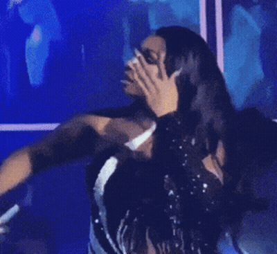 Store Worker In Glasses And Blue Vest Covering Mouth GIF