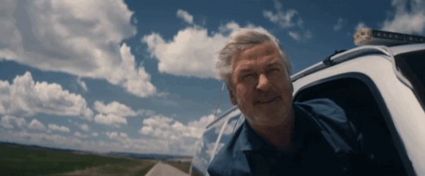 Storm Chaser Alec Baldwin Supercell Leaning Out Window GIF