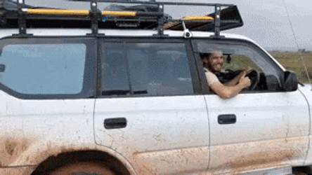 Storm Chaser Looking Outside Car Window GIF