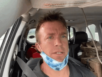 Storm Chaser Reed Timmer Putting On Red Eyeglasses GIF