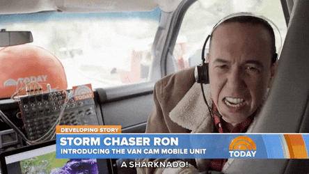 Storm Chaser Ron Reporting In Car GIF