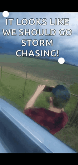 Storm Chaser Taking Videos In The Rain GIF