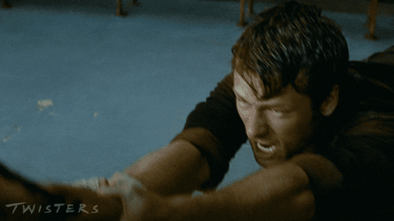 Storm Chaser Tyler Owens Holding Tight Tornado GIF