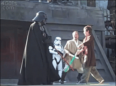 Storm Trooper Holding Green Lightsaber GIF