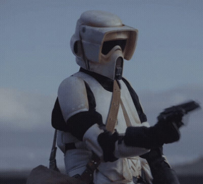 Stormtrooper Holding Gun With White Helmet GIF