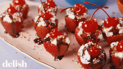 Strawberry Cupcakes With Cherries And Whipped Cream GIF
