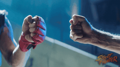 Street Fighter Logo With Fist Bump GIF