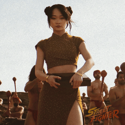 Street Fighter Poster Woman In Crop Top And Skirt GIF