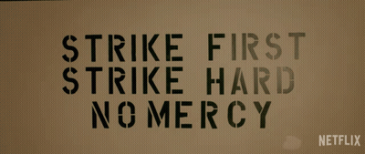 Strike First Strike Hard No Mercy Sign Netflix GIF