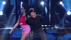 Strip Tease Robbie Williams GIF