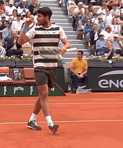 Striped Shirt Man On Tennis Court With Enc Banner GIF