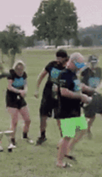 Struggling Woman On A Kickball Field GIF