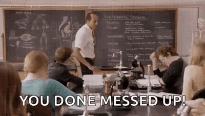 Students Sitting In Classroom With Teacher At Chalkboard GIF