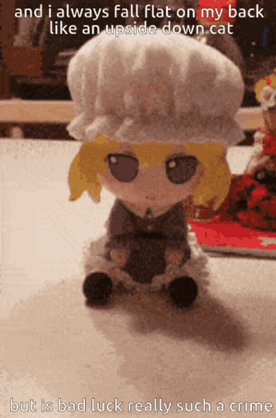 Stuffed Animal Flat On Back Like Upside Down Cat GIF