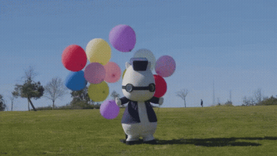 Stuffed Animal Holding Balloons GIF